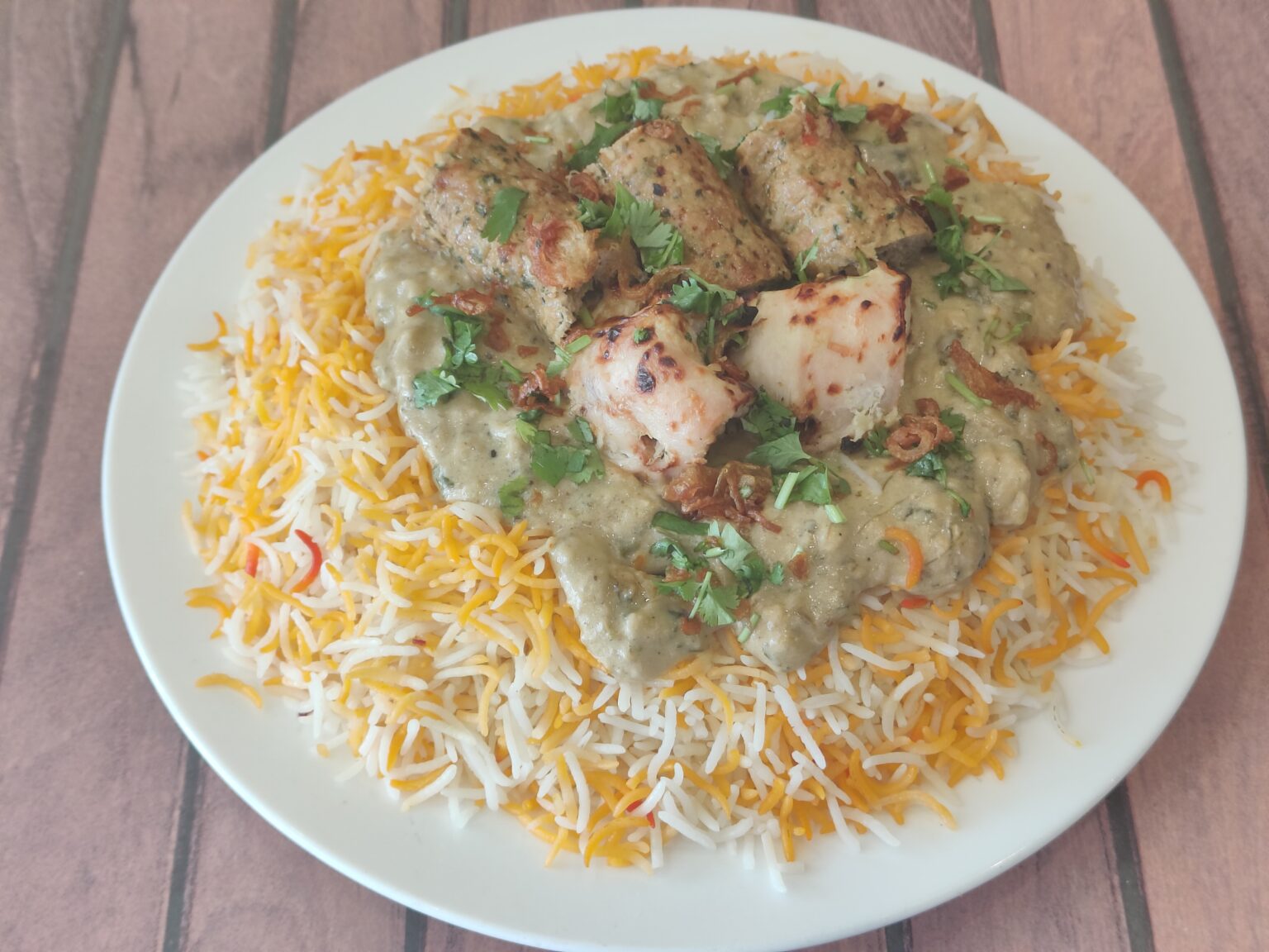 Creamy Malaika Biryani - malai tikka and seekh kebab – Paratha King Kuwait